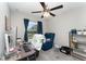 Bedroom or office with neutral walls, gray carpet, and a window with curtains at 350 N 1St Ave, Bartow, FL 33830