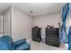 Bedroom with neutral walls, gray carpet, closet, and a window with curtains at 350 N 1St Ave, Bartow, FL 33830