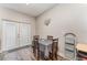 Dining area with wood floors and access to the outside at 350 N 1St Ave, Bartow, FL 33830