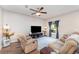 Inviting living room featuring recessed lighting, ceiling fan, and comfortable seating area at 350 N 1St Ave, Bartow, FL 33830