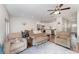Open-concept living room connects to a modern kitchen and dining area, perfect for entertaining at 350 N 1St Ave, Bartow, FL 33830