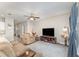 Inviting living room featuring recessed lighting, ceiling fan, and comfortable seating area at 350 N 1St Ave, Bartow, FL 33830