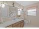 Charming bathroom with unique mirror lighting and a decorative shower curtain at 4915 Whiteoak E Dr, Lakeland, FL 33813