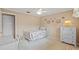 Comfortable bedroom with neutral tones, ceiling fan and matching dresser set at 4915 Whiteoak E Dr, Lakeland, FL 33813