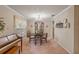 Traditional dining room with chandelier, built-in hutch, and large window at 4915 Whiteoak E Dr, Lakeland, FL 33813