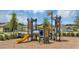Community playground with a castle theme, slide, and climbing features for Gathering fun at 2627 Skyline Loop, Kissimmee, FL 34758