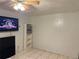 Simple bedroom with light tile floors, neutral walls, and ceiling fan at 612 Acapulca Way, Altamonte Springs, FL 32714