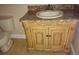 Bathroom featuring a vanity with decorative cabinet and a granite countertop with an oval sink at 665 Oak Harbour Dr # 115, Altamonte Springs, FL 32701