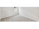 Bright bedroom featuring a window, fresh paint, and neutral carpet at 5950 Bristle Oak St, Mount Dora, FL 32757