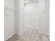 Walk-in closet with carpet floors and wire shelving at 5950 Bristle Oak St, Mount Dora, FL 32757