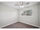Bright bedroom with carpet, a modern ceiling fan, and natural light from a window at 1037 Waynesville Ave, Lakeland, FL 33801