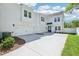 Beautiful, new white home with a three car garage and large driveway at 214 E Harding St, Orlando, FL 32806