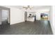 Open floor plan with stainless steel appliances and ample counter space at 3817 Corsican Pl, Lake Alfred, FL 33850