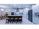 Well-equipped kitchen with a large island, modern appliances, and stylish pendant lighting at 7071 Spring Park Dr, Winter Garden, FL 34787