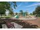 Community playground with slides and climbing structures for enjoyment at 7071 Spring Park Dr, Winter Garden, FL 34787