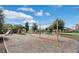 Outdoor playground with swings and slides offers fun for the whole Gathering in a secure, fenced area at 7071 Spring Park Dr, Winter Garden, FL 34787