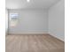 A bedroom with carpet flooring and a window showing an outside view at 385 Begonia Ct, Poinciana, FL 34759