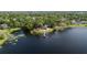 Wide aerial view showcasing the lakefront property and amenities of the lakefront home and neighborhood at 132 Margate Mews, Longwood, FL 32779