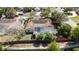 Aerial view of a private fenced pool, patio area, and the property's backyard at 132 Margate Mews, Longwood, FL 32779