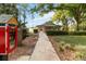 Charming clubhouse surrounded by lush landscaping in a lakeside community at 132 Margate Mews, Longwood, FL 32779