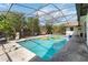 Enjoy the outdoors in this screened-in pool featuring a sparkling, refreshing swimming pool at 132 Margate Mews, Longwood, FL 32779