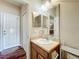 Bathroom with single sink vanity, mirror and closet at 2376 Home Again Rd, Apopka, FL 32712