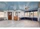 Nautical-themed living room featuring blue accents, custom woodwork, and unique architectural details at 370 Hartford Ave, Daytona Beach, FL 32118
