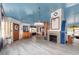 Spacious room with a statement fireplace and nautical-themed design elements at 370 Hartford Ave, Daytona Beach, FL 32118