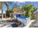 A backyard includes a hot tub, a storage shed, and patio at 4133 Staffordshire Dr, Lakeland, FL 33809