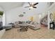A spacious living area features high ceilings, neutral tones, and ample seating for comfortable living at 4133 Staffordshire Dr, Lakeland, FL 33809