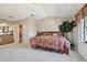 Another view of the spacious main bedroom featuring an ensuite bathroom entrance at 4133 Staffordshire Dr, Lakeland, FL 33809
