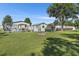 Spacious backyard with a fenced in pool and outdoor seating area, perfect for outdoor gatherings at 4719 Dove Cross Dr, Lakeland, FL 33810