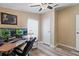 Functional office setup with desk, dual monitors, and ceiling fan, providing a comfortable work environment at 4719 Dove Cross Dr, Lakeland, FL 33810