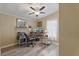Cozy office featuring a ceiling fan and desk with dual monitors, perfect for a productive workspace at 4719 Dove Cross Dr, Lakeland, FL 33810