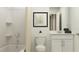 Bright bathroom featuring a tub, shower combo and single sink vanity at 4738 Bold Peacock Bnd, Bartow, FL 33830