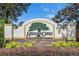 Stone and stucco community entrance sign for Hidden Oaks at 5349 Hidden Oaks Dr, Lakeland, FL 33811