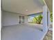 Wide covered patio with supports, providing ample space for outdoor enjoyment at 5349 Hidden Oaks Dr, Lakeland, FL 33811
