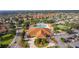 Aerial view highlighting the community clubhouse, pool, and recreational facilities amidst lush landscaping at 10367 Addison Shore Way, Oxford, FL 34484
