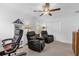 Home office with comfortable seating, built-in shelving, natural light, and a closet at 10367 Addison Shore Way, Oxford, FL 34484