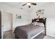 Comfortable bedroom with a queen-size bed, neutral decor, and ample natural light from a window at 6109 Apollos Corner Way, Orlando, FL 32829