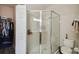 Clean and modern shower with a glass enclosure, tiled walls, and a convenient toilet at 6109 Apollos Corner Way, Orlando, FL 32829