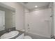 Bright bathroom with tile surround bathtub, undermount sink and vanity at 1022 Foreshore Ln, Haines City, FL 33844