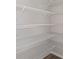 Spacious walk-in closet with plenty of wire rack shelving for ample storage at 1022 Foreshore Ln, Haines City, FL 33844