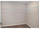 Empty walk-in closet space with wire rack shelving and neutral carpeting at 1022 Foreshore Ln, Haines City, FL 33844