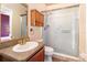 Cozy bathroom with a walk-in shower and vanity at 1300 Holly Glen Run, Apopka, FL 32703