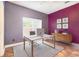 Stylish home office featuring a modern desk, decor, and carpet at 1300 Holly Glen Run, Apopka, FL 32703
