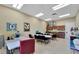 Spacious activity room with tables, chairs, and ample storage space, ideal for community events at 2991 Wood Duck Dr, Polk City, FL 33868