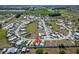 A high aerial view of a community, showing many homes and green spaces at 2991 Wood Duck Dr, Polk City, FL 33868