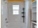 This bright bathroom features a shower and bath combo and white tiled walls at 2991 Wood Duck Dr, Polk City, FL 33868