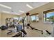 Fitness center with exercise equipment and outside views at 2991 Wood Duck Dr, Polk City, FL 33868
